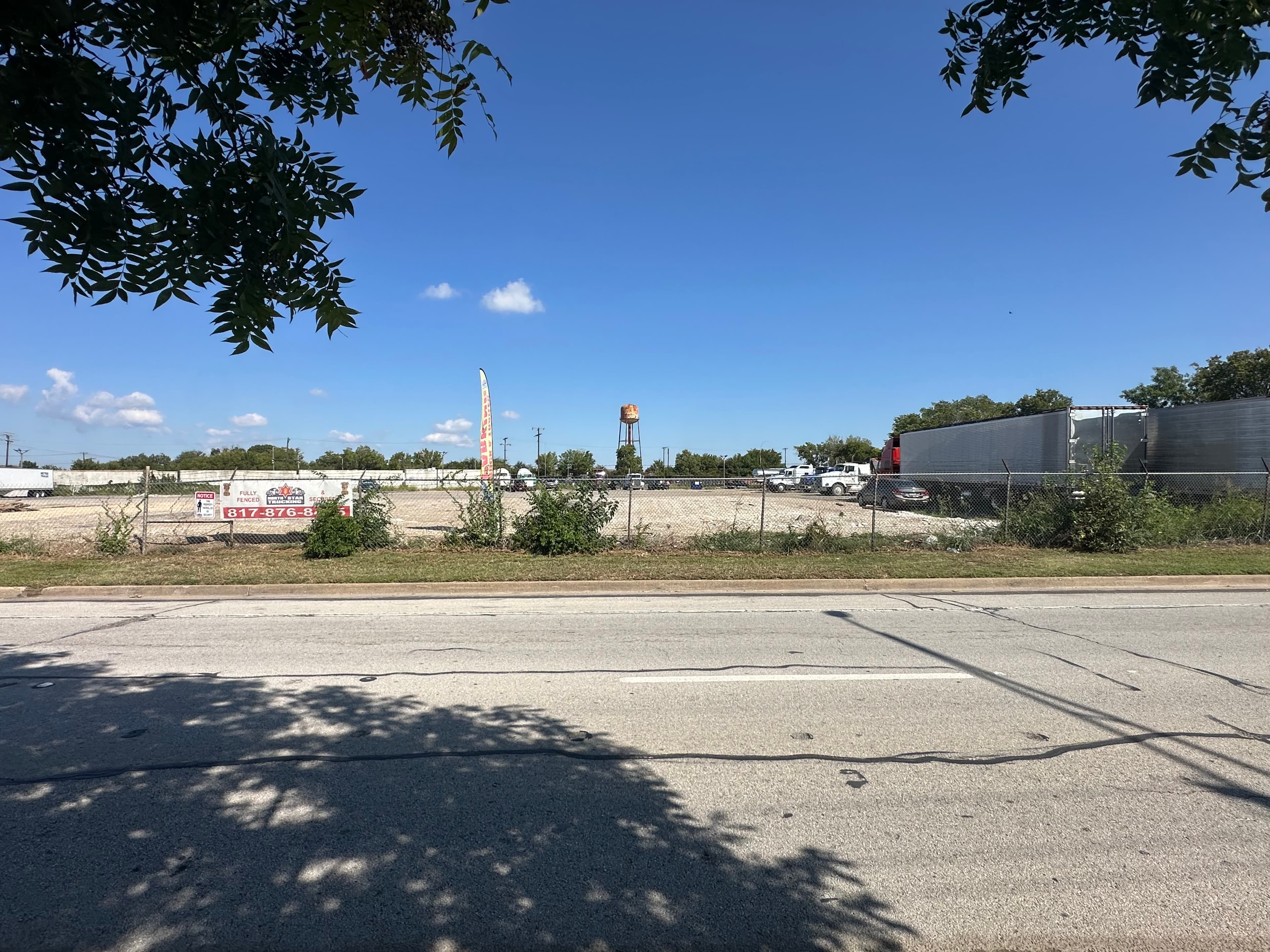 Gated entrance to secure truck parking facility