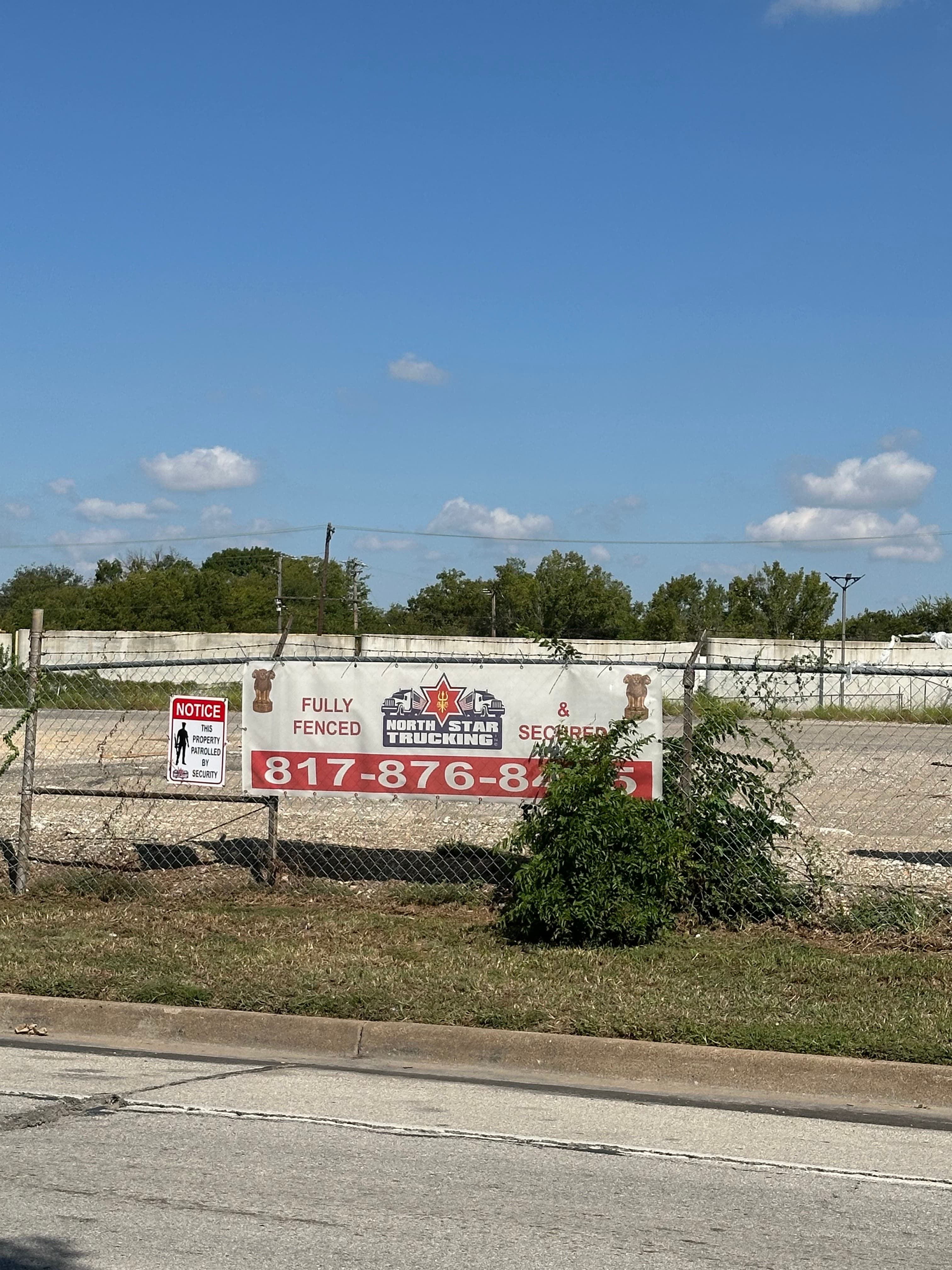 Security fencing around Fort Worth truck parking lot